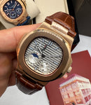 Patek Philippe Nautilus Fases da Lua 40mm, Aço/Rose, Mostrador Prata
