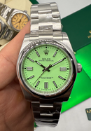Rolex Oyster Perpetual 41/36mm Aço Mostrador Verde Luneta Baulada