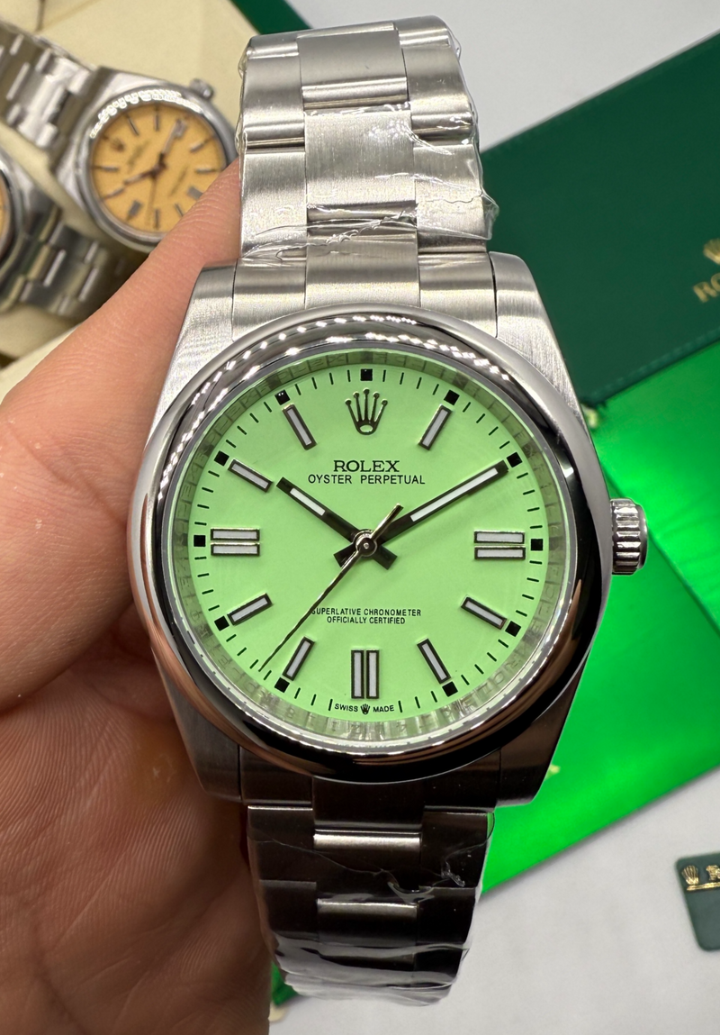 Rolex Oyster Perpetual 41/36mm Aço Mostrador Verde Luneta Baulada