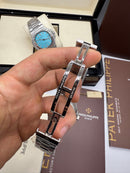 Patek Philippe Nautilus 39mm, Mostrador Cinza, Pulseira Aço