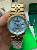 Rolex Oyster Perpetual Land‑Dweller 40mm Aço/Dourado, Mostrador Azul Glacial