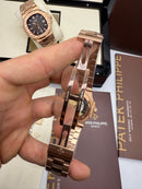 Patek Philippe Nautilus 39mm, Aço/Rose, Mostrador Preto