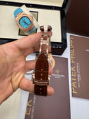 Patek Philippe Nautilus 39mm, Aço/Rose Mostrador Chumbo, Pulseira Couro