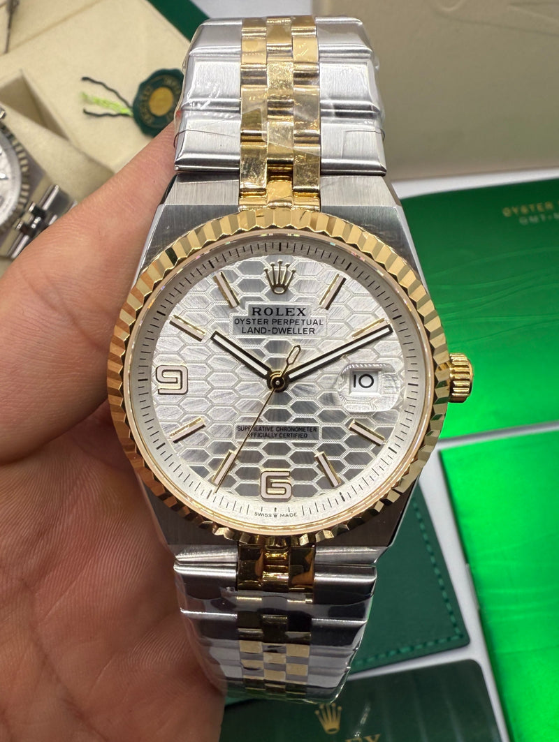 Rolex Oyster Perpetual Land‑Dweller 40mm Aço/Dourado, Mostrador Prata