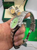 Rolex Oyster Perpetual 41/36mm Aço Mostrador Verde Luneta Baulada