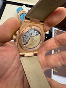 Patek Philippe Nautilus 39mm, Aço/Rose Mostrador Chumbo, Pulseira Couro