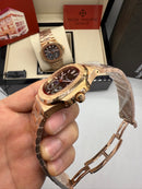 Patek Philippe Nautilus Fases da Lua 40mm, Aço/Rose, Mostrador Verde