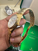 Rolex Oyster Perpetual Land‑Dweller 40mm Dourado, Mostrador Prata