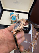 Patek Philippe Nautilus 39mm, Aço/Rose Mostrador Chumbo, Pulseira Couro