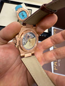 Patek Philippe Nautilus 39mm, Aço/Rose Mostrador Branco, Pulseira Couro