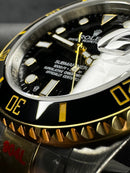 Rolex Submariner Date 41mm Aço/Dourado Mostrador Preto Luneta Preta