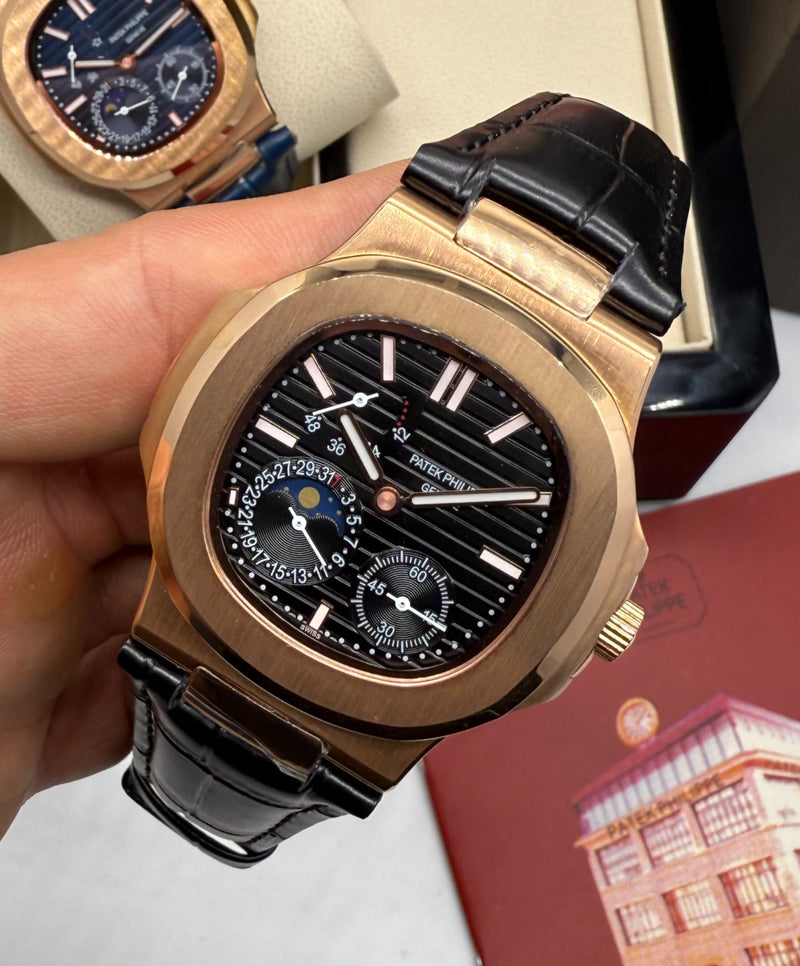 Patek Philippe Nautilus Fases da Lua 40mm, Aço/Rose, Mostrador Preto