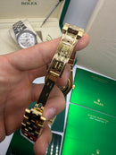 Rolex Oyster Perpetual Land‑Dweller 40mm Dourado, Mostrador Prata