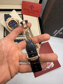 Patek Philippe Nautilus Fases da Lua 40mm, Aço/Rose, Mostrador Preto