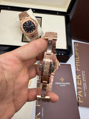 Patek Philippe Nautilus 39mm, Aço/Rose, Mostrador Marrom