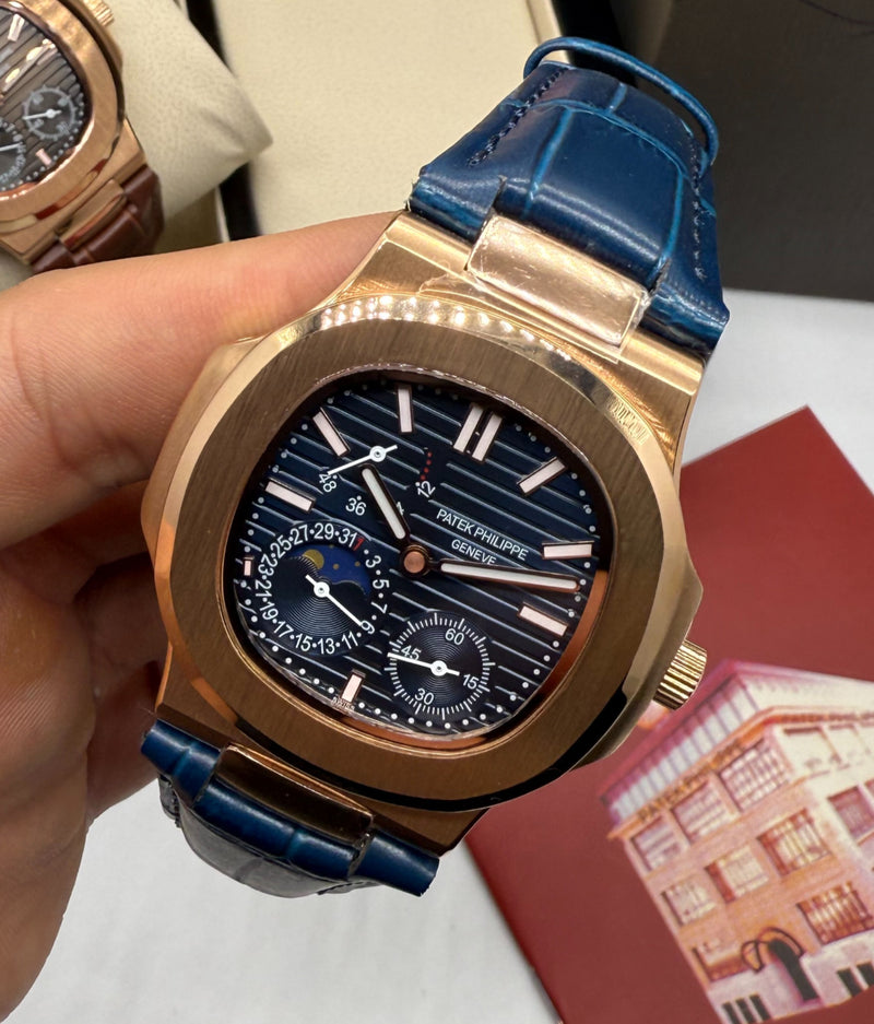Patek Philippe Nautilus Fases da Lua 40mm, Aço/Rose, Mostrador Azul