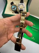 Rolex Daytona 40mm Dourado Mostrador Branco Luneta Preta