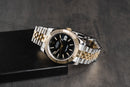 Rolex Datejust 41/36mm Aço/Dourado Mostrador Preto Luneta Canelada