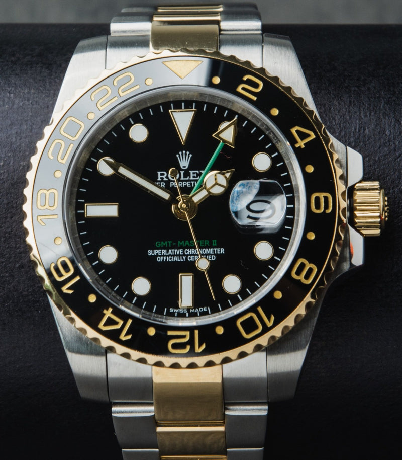 Rolex GMT-Master II 40mm Aço/Dourado Mostrador Preto Luneta Preta
