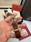 Patek Philippe Nautilus Fases da Lua 40mm, Aço/Rose, Mostrador Marrom