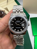 Rolex Date-Just 31mm/36mm Aço, Mostrador Preto, Luneta Canelada