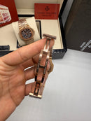 Patek Philippe Nautilus Fases da Lua 40mm, Aço/Rose, Mostrador Prata