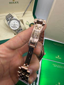Rolex Oyster Perpetual Land‑Dweller 40mm Aço/Rose, Mostrador Azul Glacial