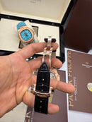 Patek Philippe Nautilus 39mm, Aço/Rose Mostrador Chumbo, Pulseira Couro