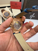 Patek Philippe Nautilus Fases da Lua 40mm, Aço/Rose, Mostrador Azul