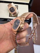 Patek Philippe Nautilus 39mm, Aço/Rose, Mostrador Preto