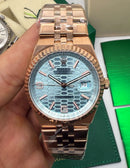 Rolex Oyster Perpetual Land‑Dweller 40mm Aço/Rose, Mostrador Azul Glacial