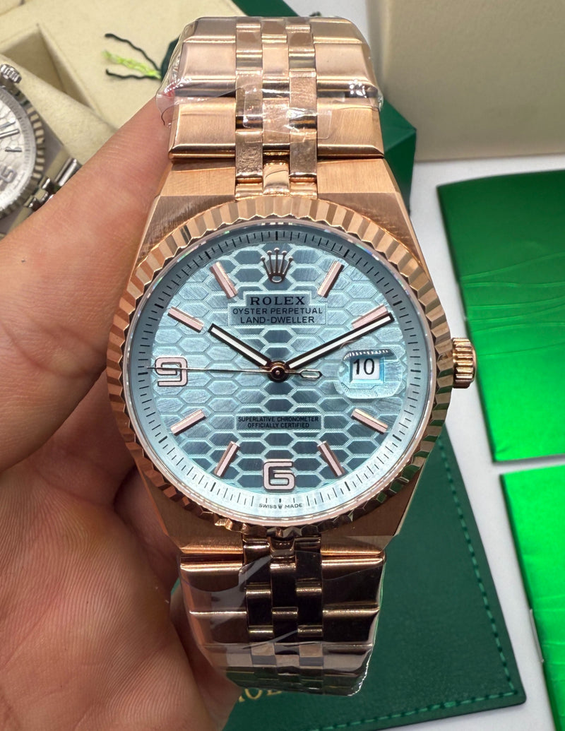 Rolex Oyster Perpetual Land‑Dweller 40mm Aço/Rose, Mostrador Azul Glacial