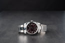 Rolex Oyster Perpetual 41/36mm Aço Mostrador Cereja Luneta Baulada