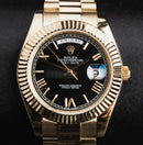 Rolex Day-Date 40mm Dourado, Mostrador Preto Luneta Canelada