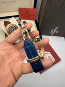 Patek Philippe Nautilus Fases da Lua 40mm, Aço/Rose, Mostrador Azul