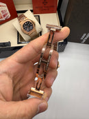 Patek Philippe Nautilus Fases da Lua 40mm, Aço/Rose, Mostrador Marrom