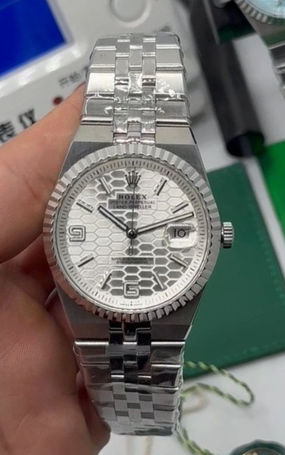Rolex Oyster Perpetual Land‑Dweller 40mm, Mostrador Prata