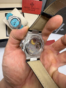 Patek Philippe Nautilus Fases da Lua 40mm, Aço, Mostrador Preto