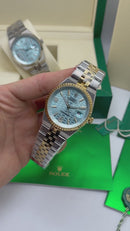 Rolex Oyster Perpetual Land‑Dweller 40mm Aço/Dourado, Mostrador Azul Glacial