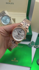 Rolex Oyster Perpetual Land‑Dweller 40mm Aço/Rose, Mostrador Prata